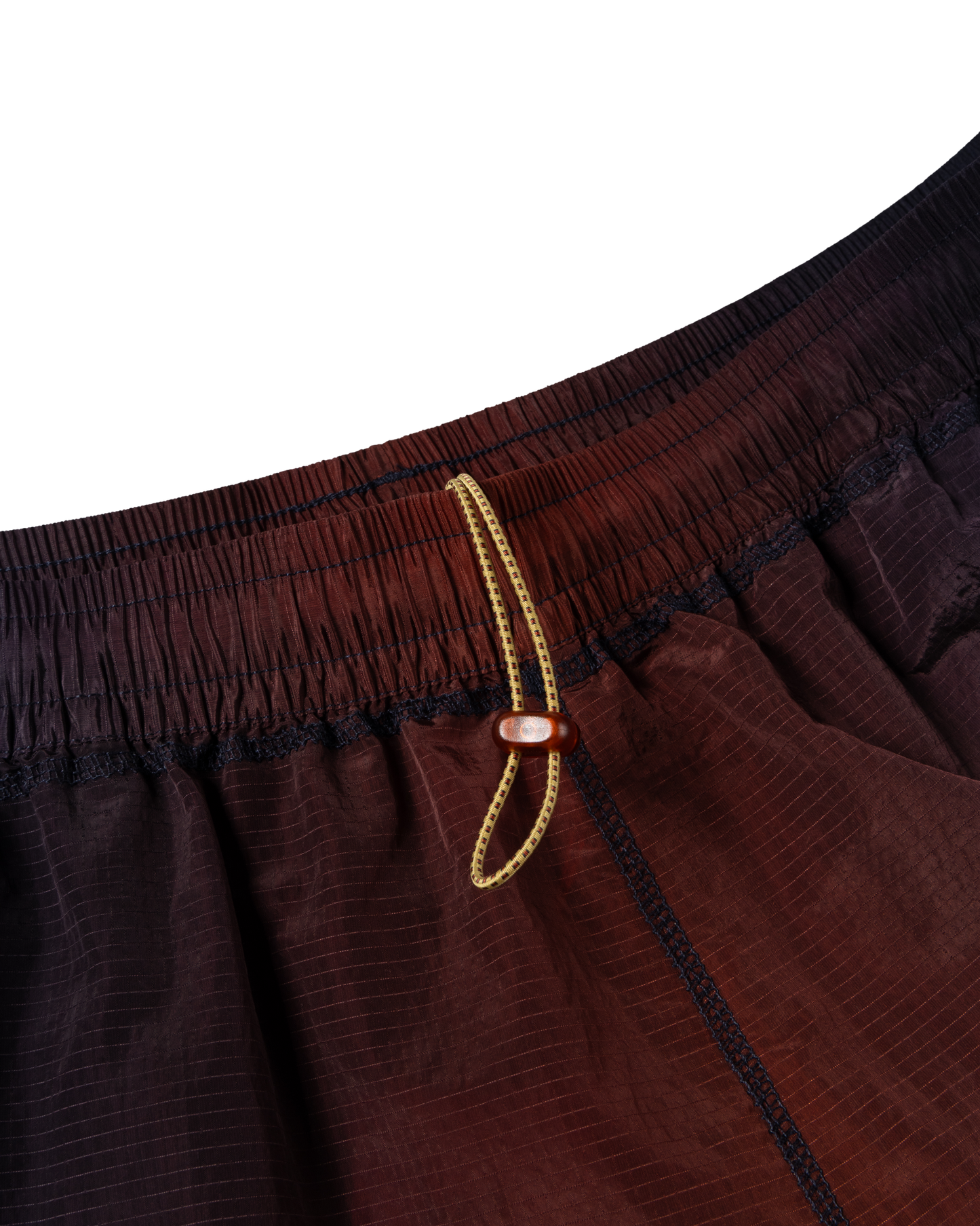 puma x aries ombre nylon laced pants